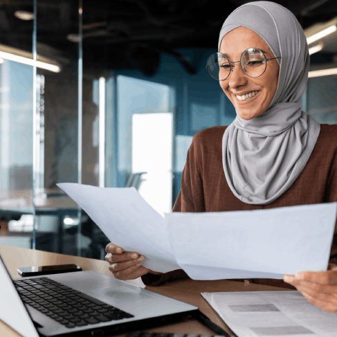A translator formats a USCIS-ready certification statement for Arabic Translation Services in Texas on an affidavit page.