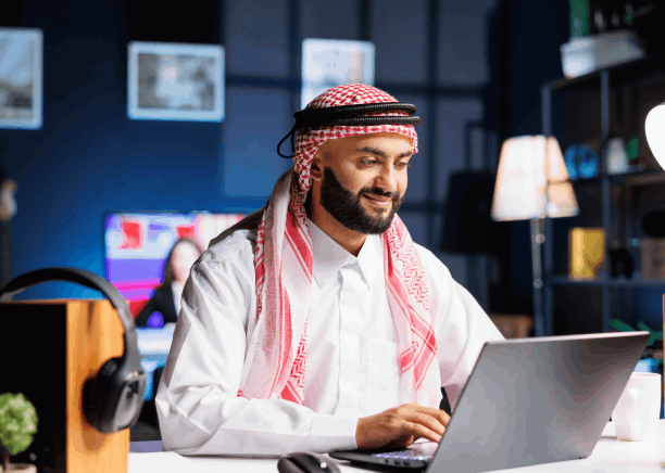 Two certified Arabic linguists compare Arabic and English pages while Arabic Translation Services in Texas ensure accuracy.