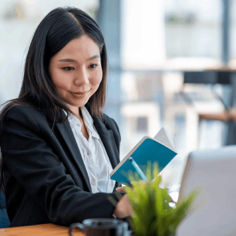 A translator formats a certified USCIS translation to match originals, providing Vietnamese Translation Services in Texas.