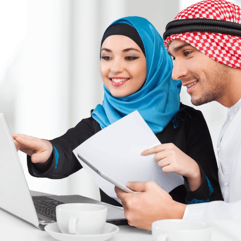 A translator compares Arabic affidavits with English text, using Arabic Translation Services in Texas to meet legal.