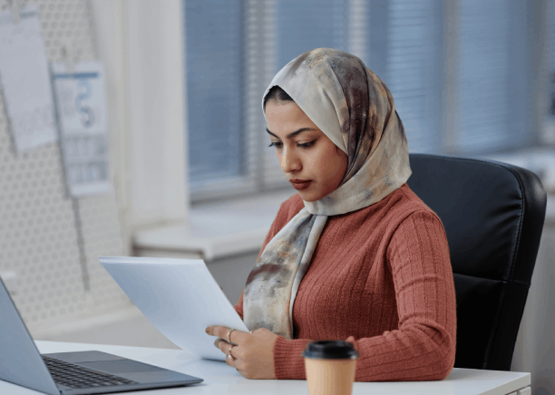 A translator works under an NDA on Arabic balance sheets, using Arabic Translation Services in Texas for financial files.