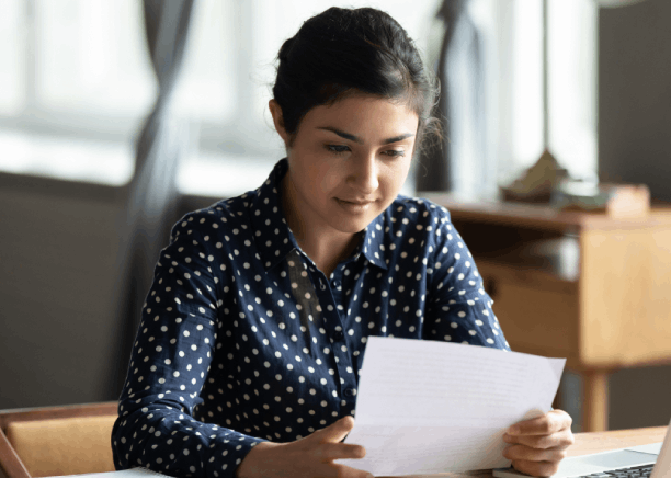 A Texas resident uploads personal forms for Hindi Translation Services in Texas, checking names and dates for accuracy.